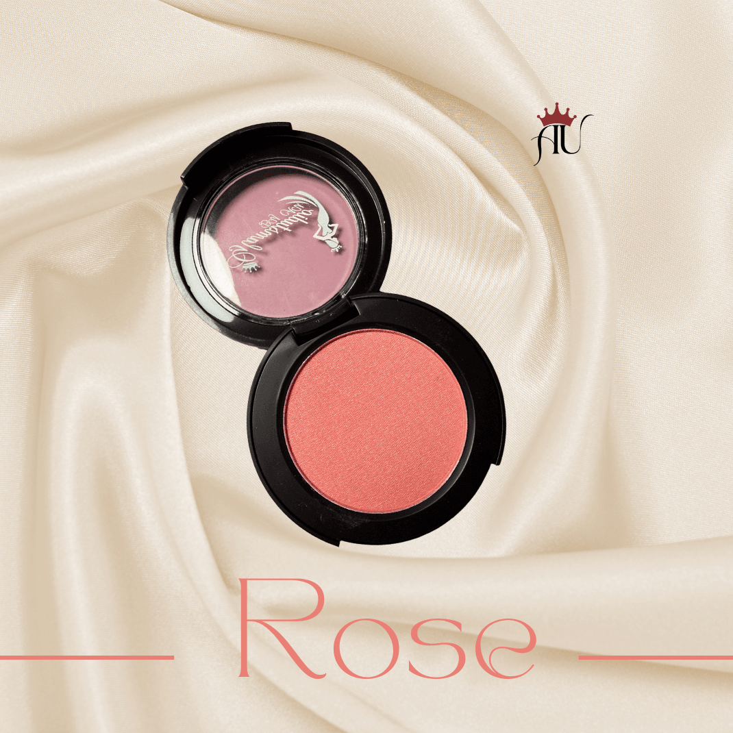 Rose Powder Blush in sleek compact with warm rosy hue and soft satin finish on silk background