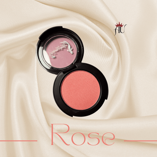 Rose Powder Blush in sleek compact with warm rosy hue and soft satin finish on silk background