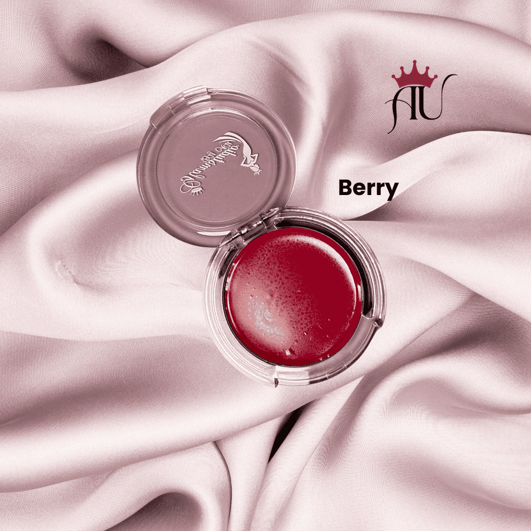 Berry Cream Blush in bold berry-pink shade with hydrating, lightweight cream formula on pink satin background