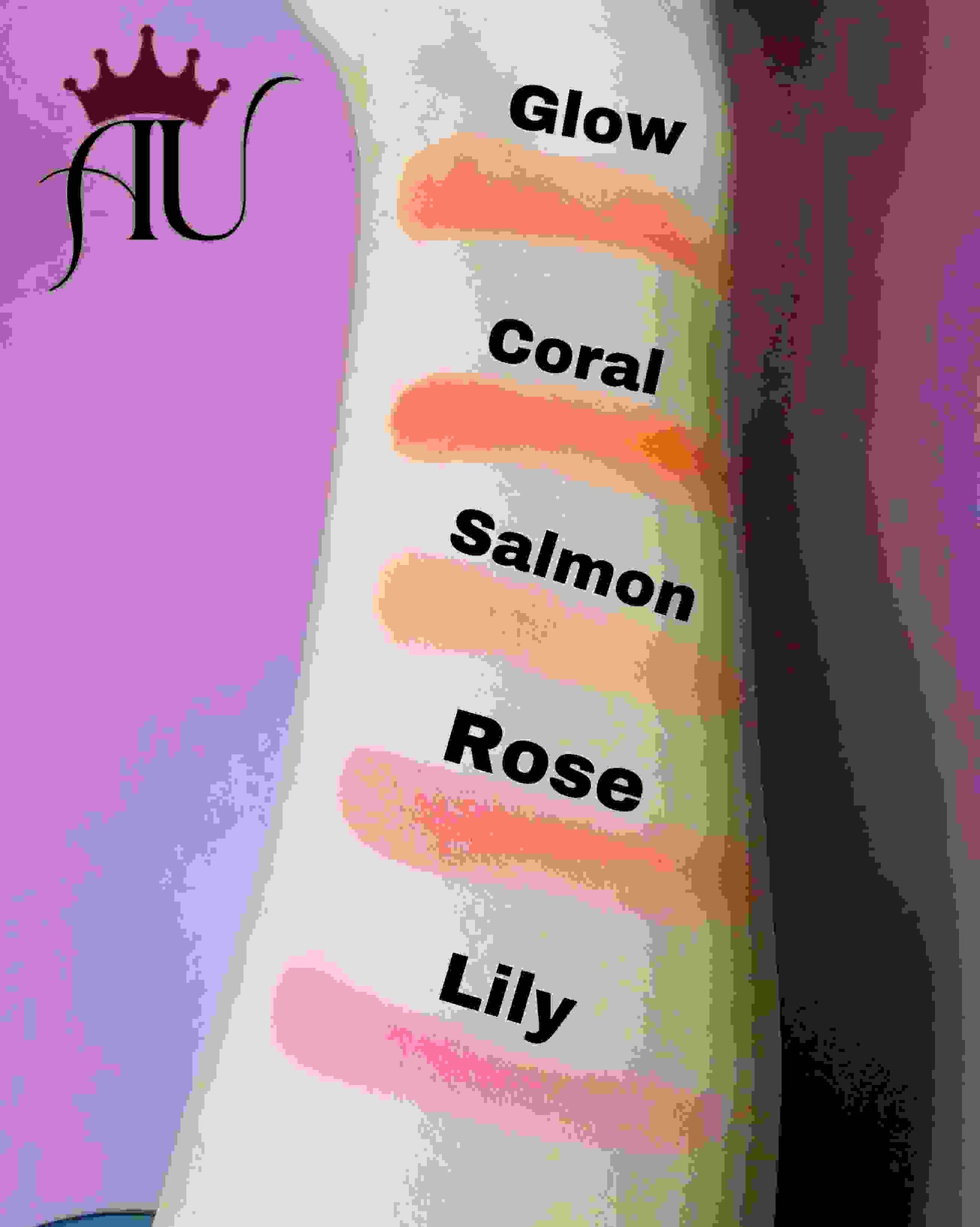 Color swatches of lipsticks labeled 'Glow', 'Coral', 'Salmon', 'Rose', and 'Lily' on a person's arm with a visible brand logo.