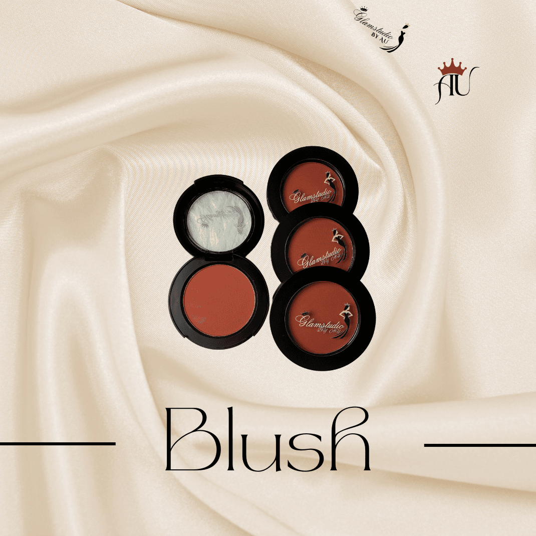 Glow Powder Blush by AU in black compact with mirror on satin fabric background